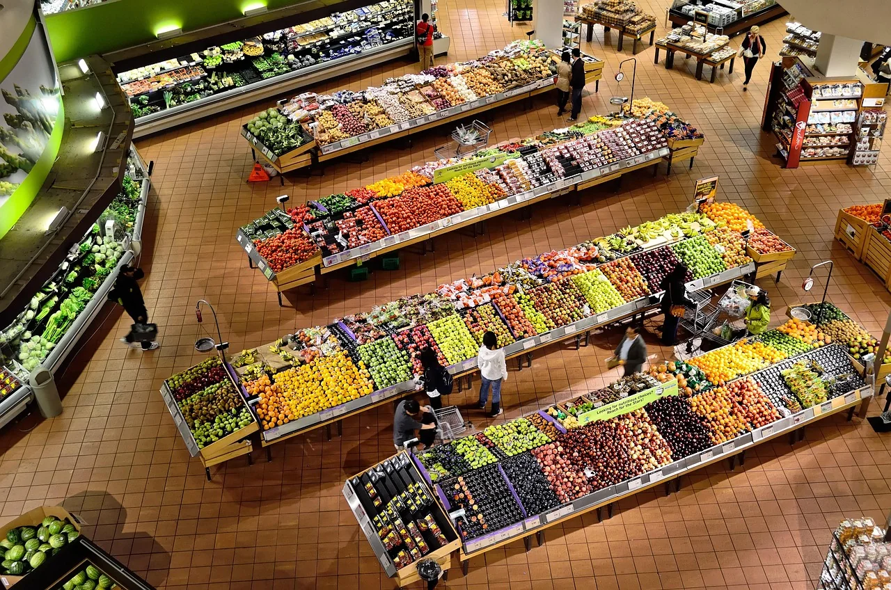 Fruit and vegetable aisles in a large supermarket, seen from above