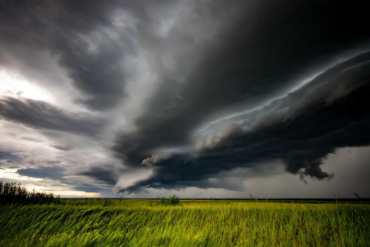 Dark storm clouds gathering over the countryside