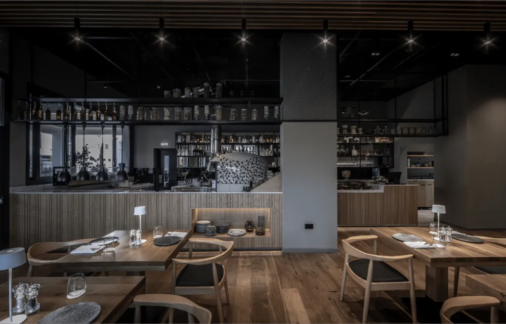 Modern dining room and open kitchen at Nema restaurant in Paphos