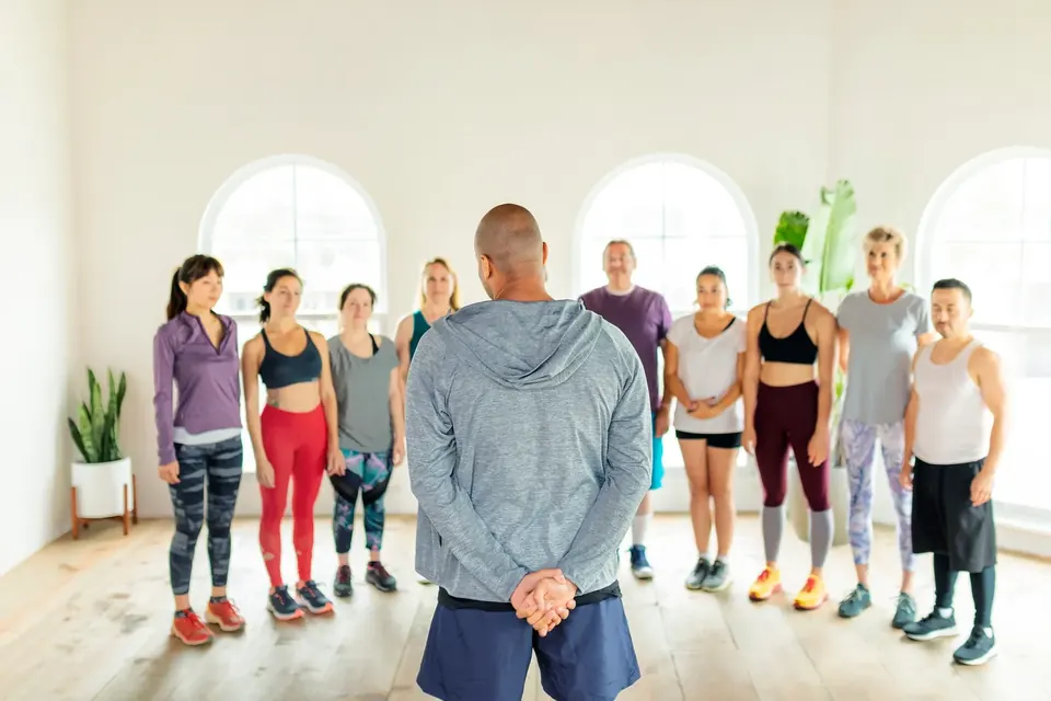 Group fitness class with an instructor at Rewell Emotion Fitness in Peyia
