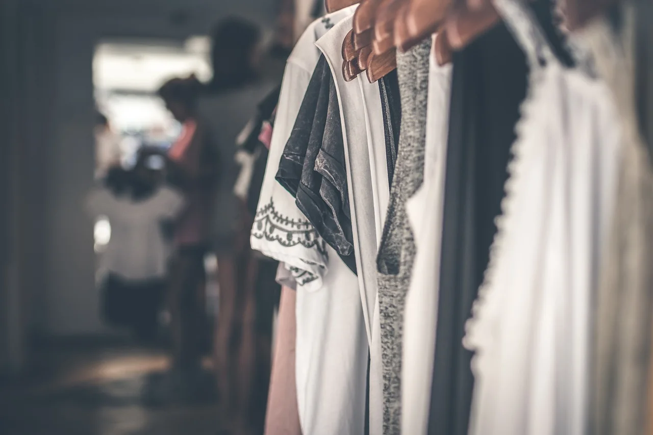 Clothes on a rail in a fashion boutique