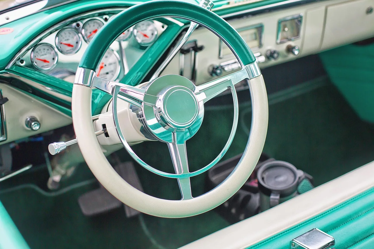 Learner driver's hands on the steering wheel during a driving lesson