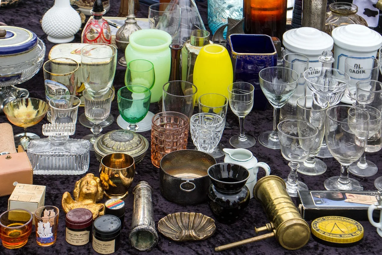 Second-hand clothes and bric-a-brac on a flea market stall, as found at markets in Cyprus